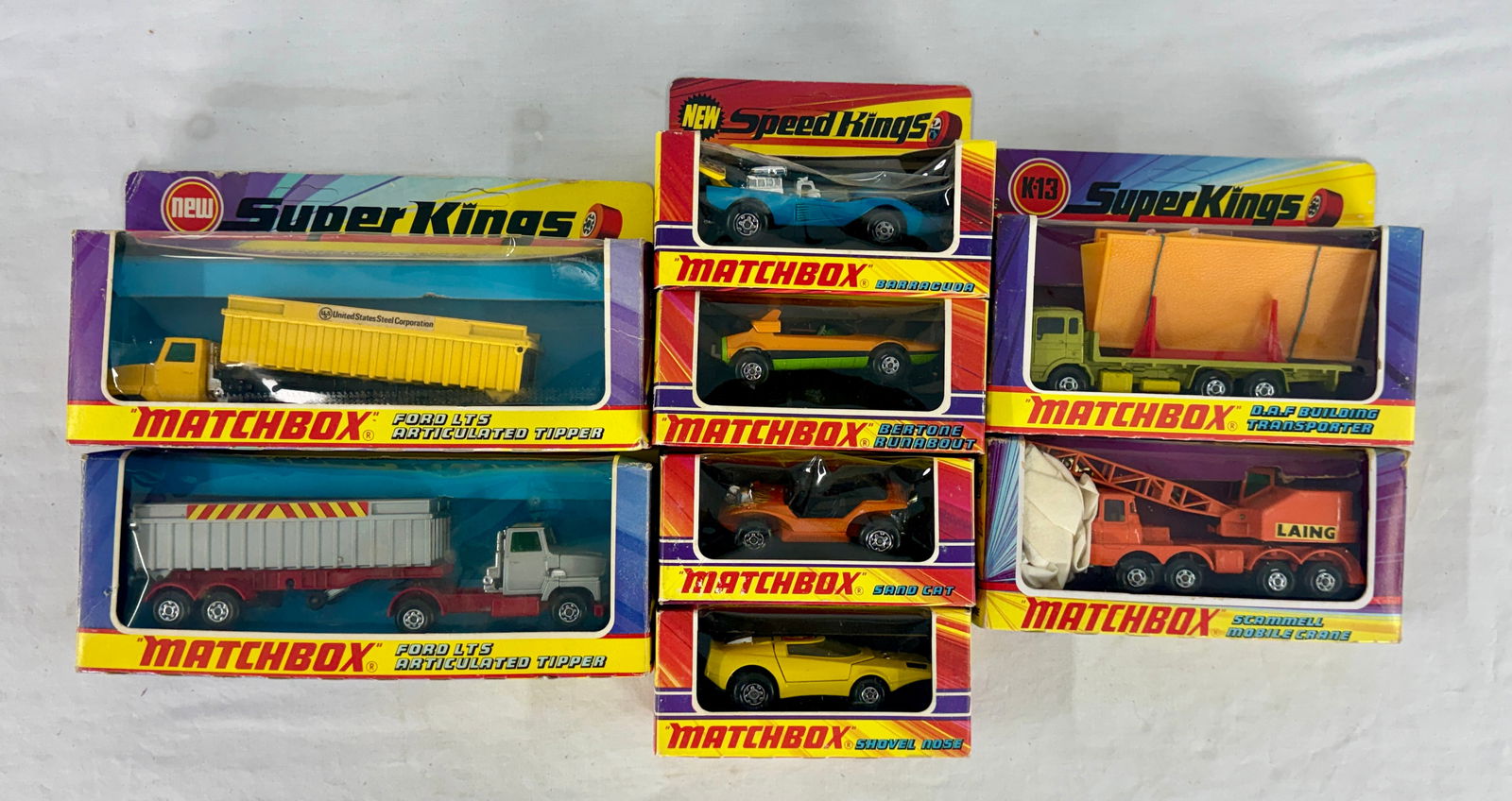 Nine Matchbox Super Kings Die-Cast Vehicles in Original Packaging: K 12, K 13, two different K 18 one with one original box, K 31, K 32, K 37, K 51 most have unpunched hanger holes original boxes C 8â€“9.