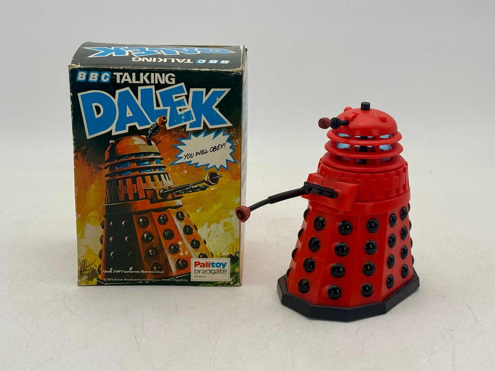 Palitoy Bradgate BBC Talking Dalek Toys: Multi-colored boxed BBC TALKING DALEK marked 'Palitoy Bradgate', '1978 British Broadcasting Corporation', 'Made in Hong Kong' with phrases like 'YOU WILL OBEY!', original box minor wear, C8-9.