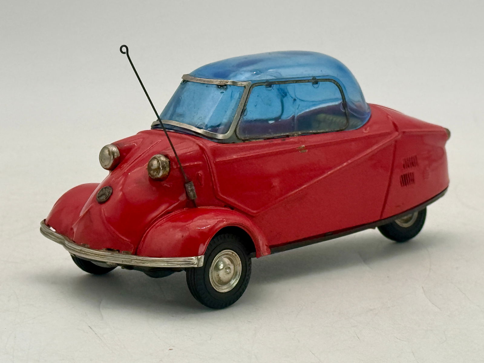 A Bandai Red Tin Messerschmitt KR200 Toy Microcar (1 of 2)