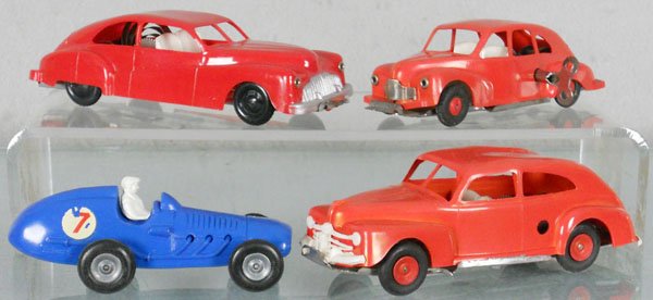 4 MINIC AUTOS: plastic, 3132 Buick, windup working, seats loose, 3131 Ford Tudor, warped, windup working, discolored, 3123 Jowett Javelin, front fender warped, windup working sluggishly, body loose, M348 Lotus Racer