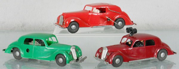 3 MINIC AUTOS: plastic, 3128 Armstrong Siddeley Hurricane Saloon, graffiti on base, windup working, w/key, 3031 Riley Saloon, windup working, 3133 Riley Police Car, friction working sluggishly, C8-9.