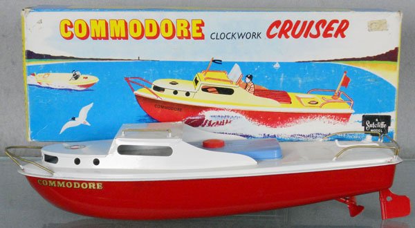 SUTCLIFFE COMMODORE CRUISER: painted tin, missing 2 flags, windshield & 1 handrail, windup working, w/key, 12 1/2" long, orig box some wear, C8-9.