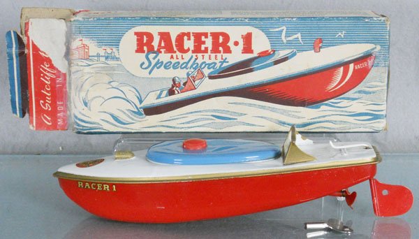 SUTCLIFFE RACER 1 SPEEDBOAT: painted tin, 9 1/4" long, windup working, w/key, orig box worn, flaps taped on 1 end, C8.