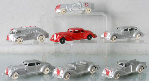 7 HUBLEY KIDDIE TOYS VEHICLES: 5 Packards, Texaco Tanker & Racer, C5-6.