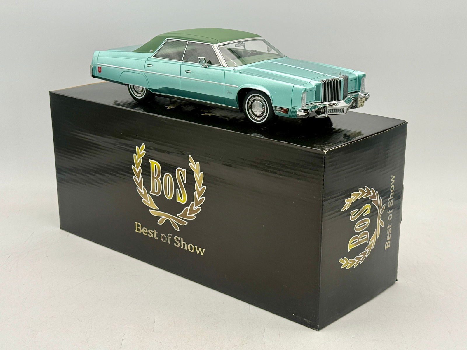 BoS-Models #097 1975 Chrysler Imperial Model Car: A 1:18 scale resin metallic light green and dark green 1975 Chrysler Imperial model car by BoS-Models with its original box. #71 of 1000, OB mw C9