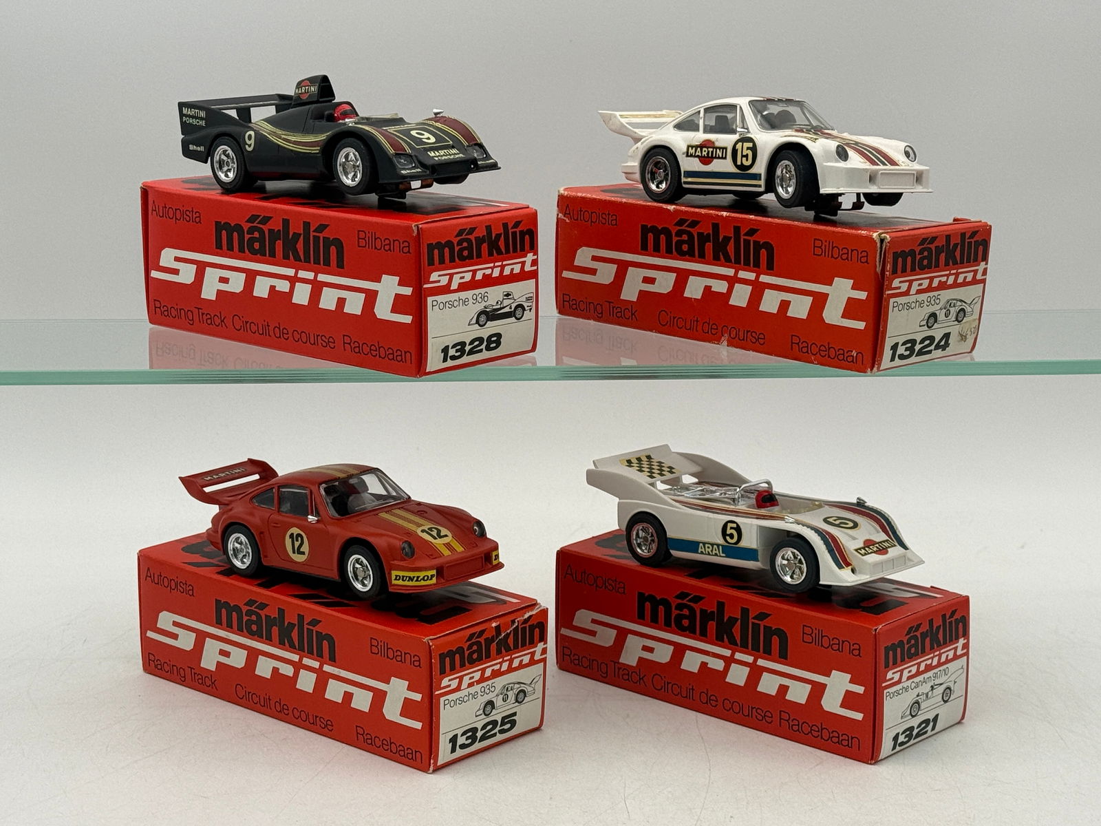 A Collection of M?¤rklin Sprint Porsche Slot Cars with Boxes (1 of 3)
