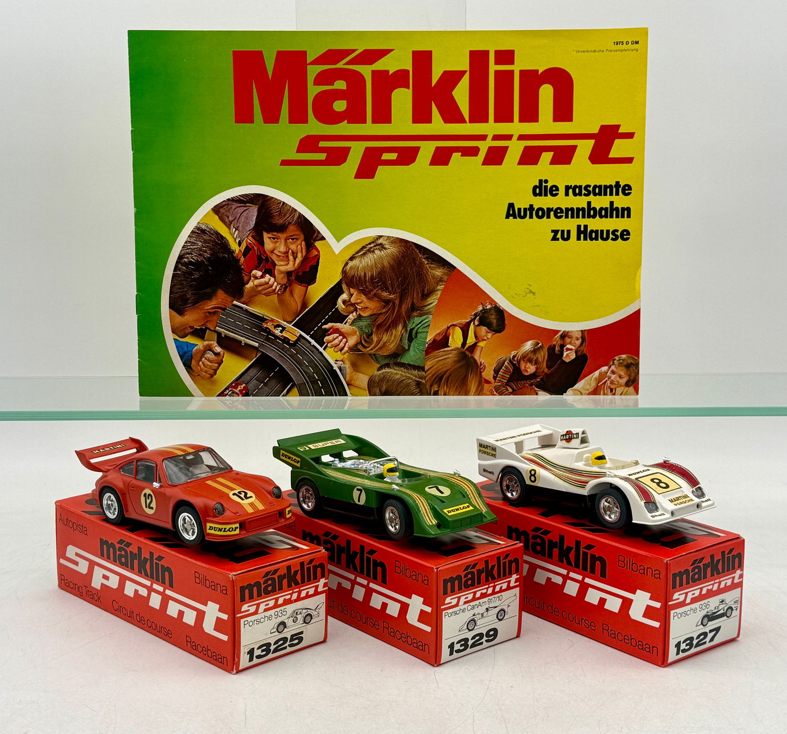 A Trio of M?¤rklin Sprint Porsche Slot Cars with Catalog (1 of 3)