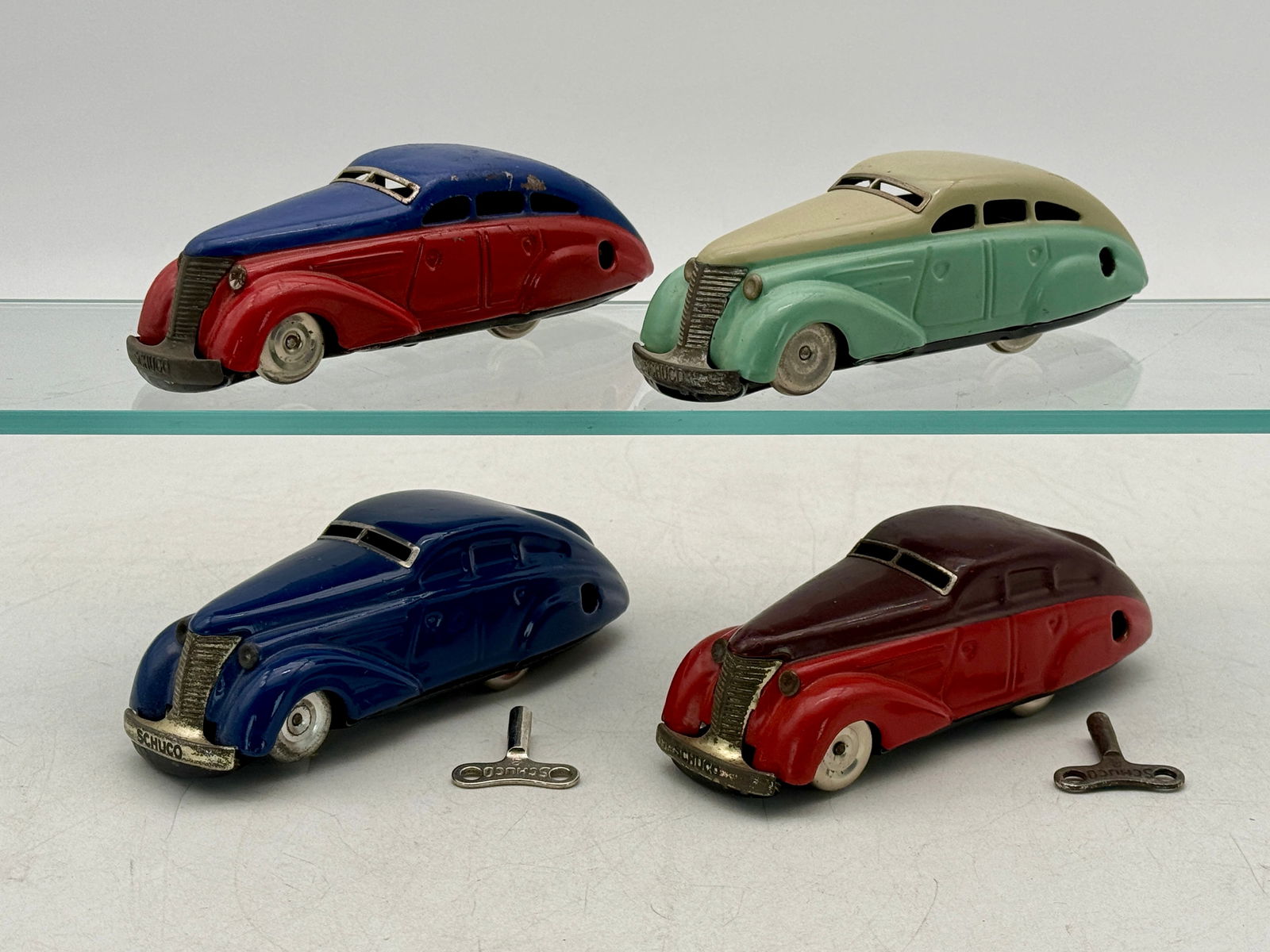 A Collection of Schuco Patent 1010 Clockwork Toy Cars (1 of 3)