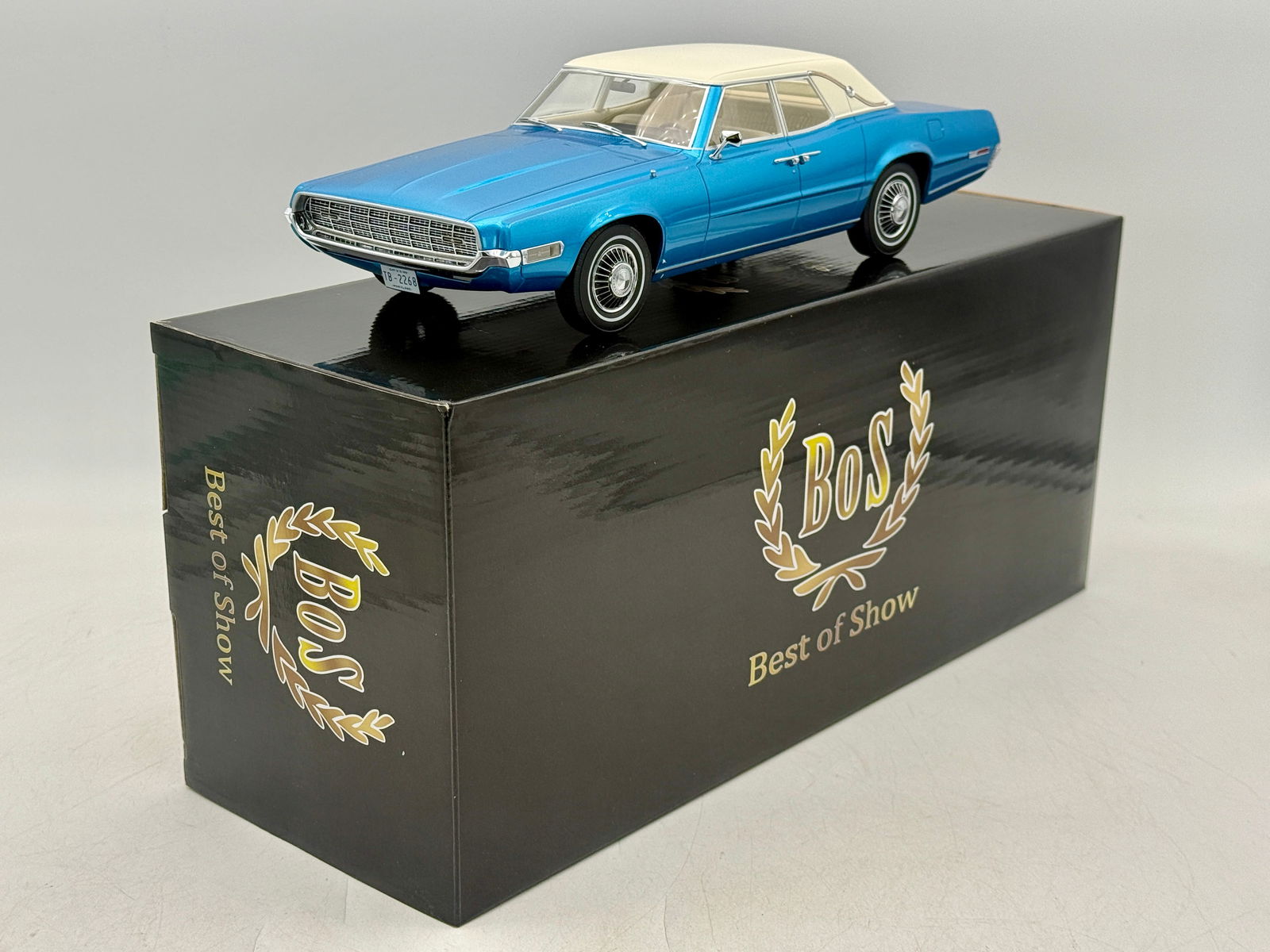 BoS #229 1968 Ford Thunderbird 4-Door Sedan: A BoS 1:18 scale resin model of a 1968 Ford Thunderbird 4-door sedan featuring a metallic blue body and white roof, complete with the original box. 11.5" long #244 of 1000. OB MW C9.