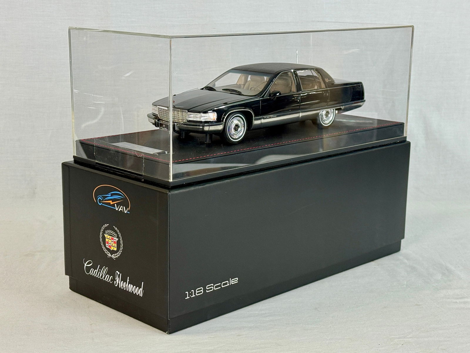 VAV SZ NAN YANG 201805 Cadillac Fleetwood Limited Edition Model: A 1:18 scale black Cadillac Fleetwood model car by VAV SZ NAN YANG featuring a tan interior and a display base numbered 147 of 500. resin, 12" long OB C9-10.