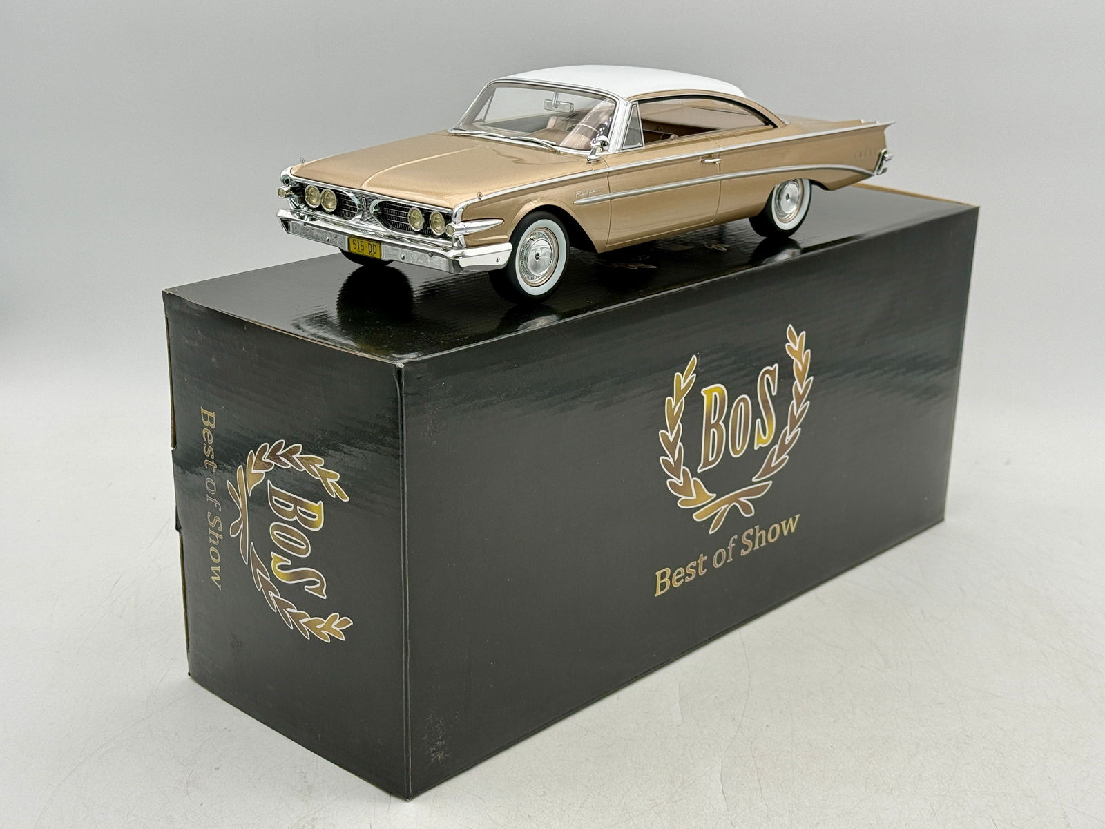 BoS-Models #386 1960 Edsel Ranger Hardtop: A 1:18 scale gold and white BoS-Models 1960 Edsel Ranger Hardtop model car with its original black storage box. #386, resin, 12" long #193 out of 252. OB mw C9.