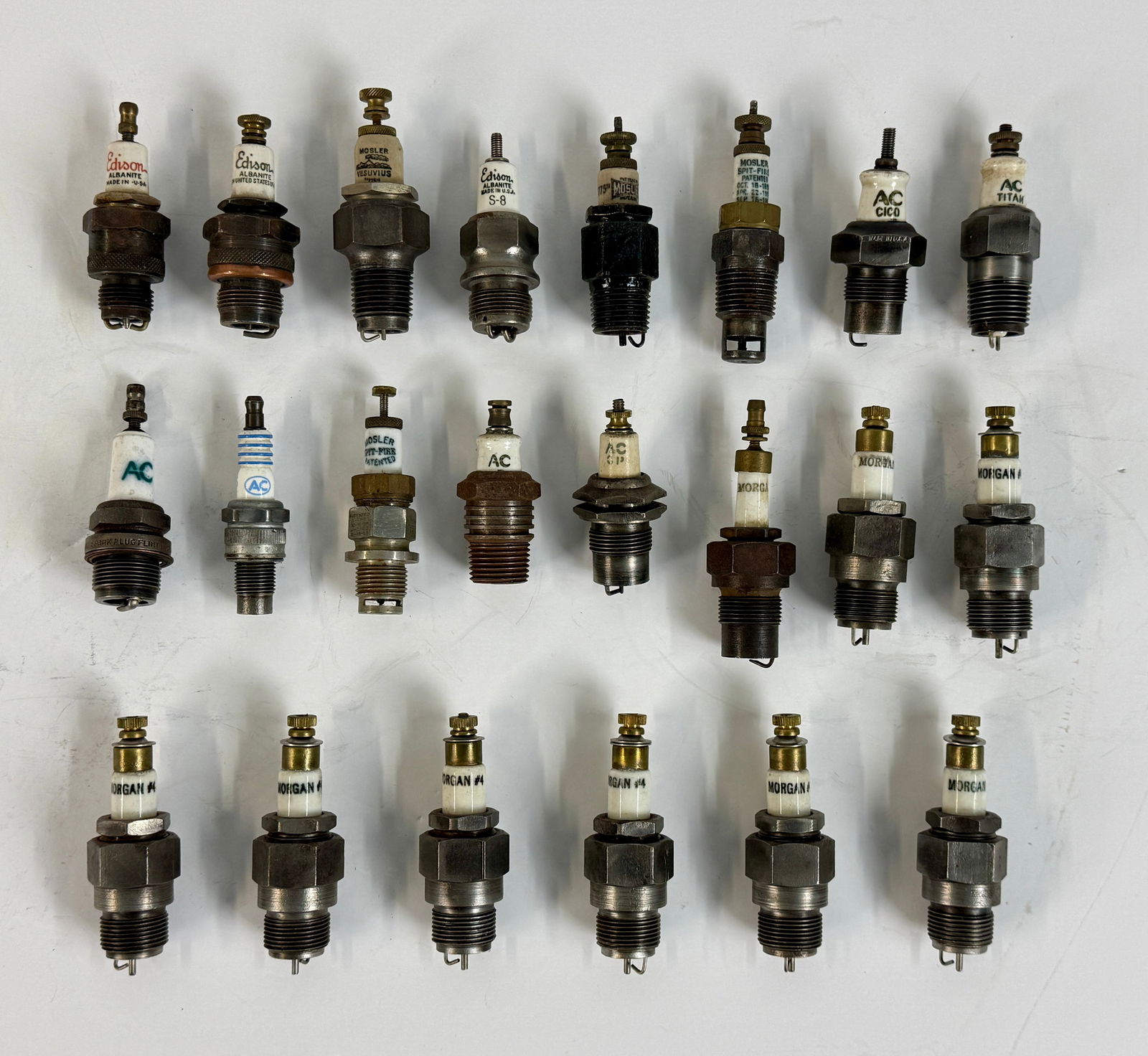 A Collection of 22 Vintage Metallic and Ceramic Spark Plugs (1 of 2)