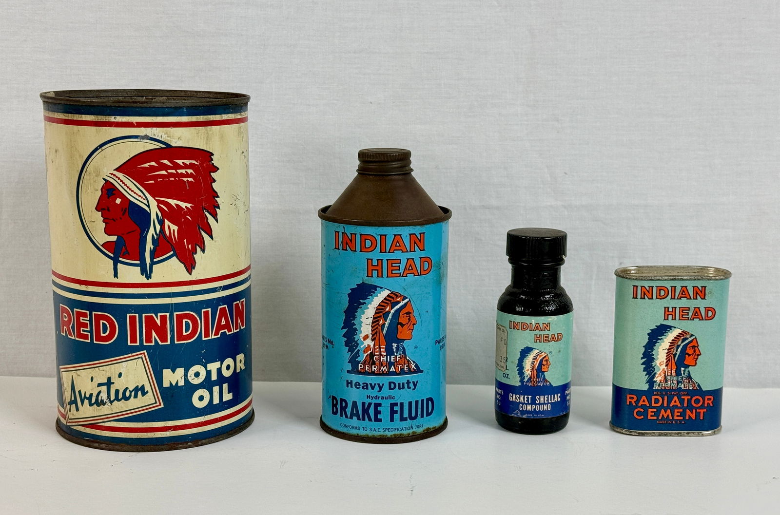 A Collection of Vintage Red Indian and Indian Head Containers (1 of 2)