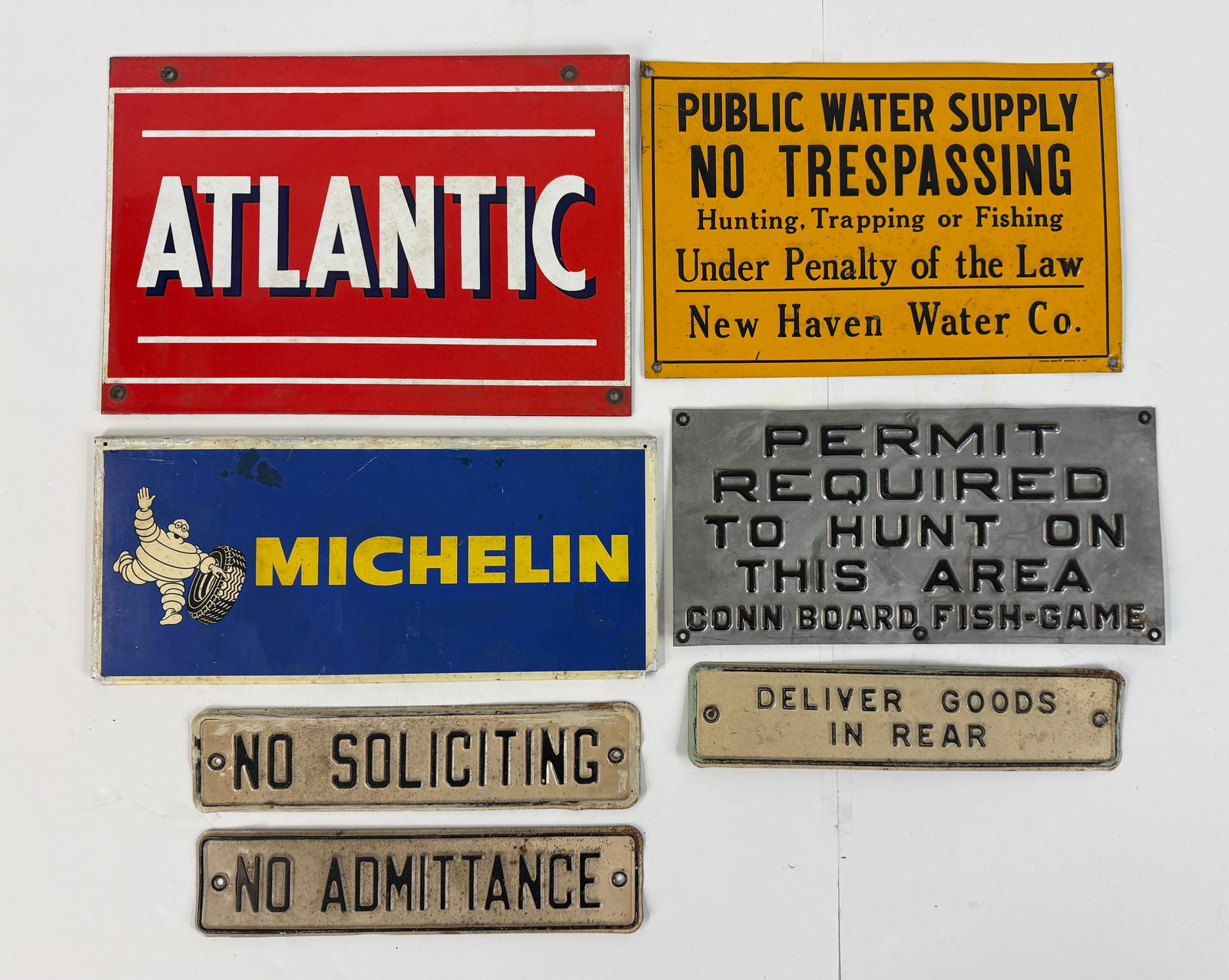 A Collection of Vintage Porcelain and Metal Advertising Signs (1 of 1)