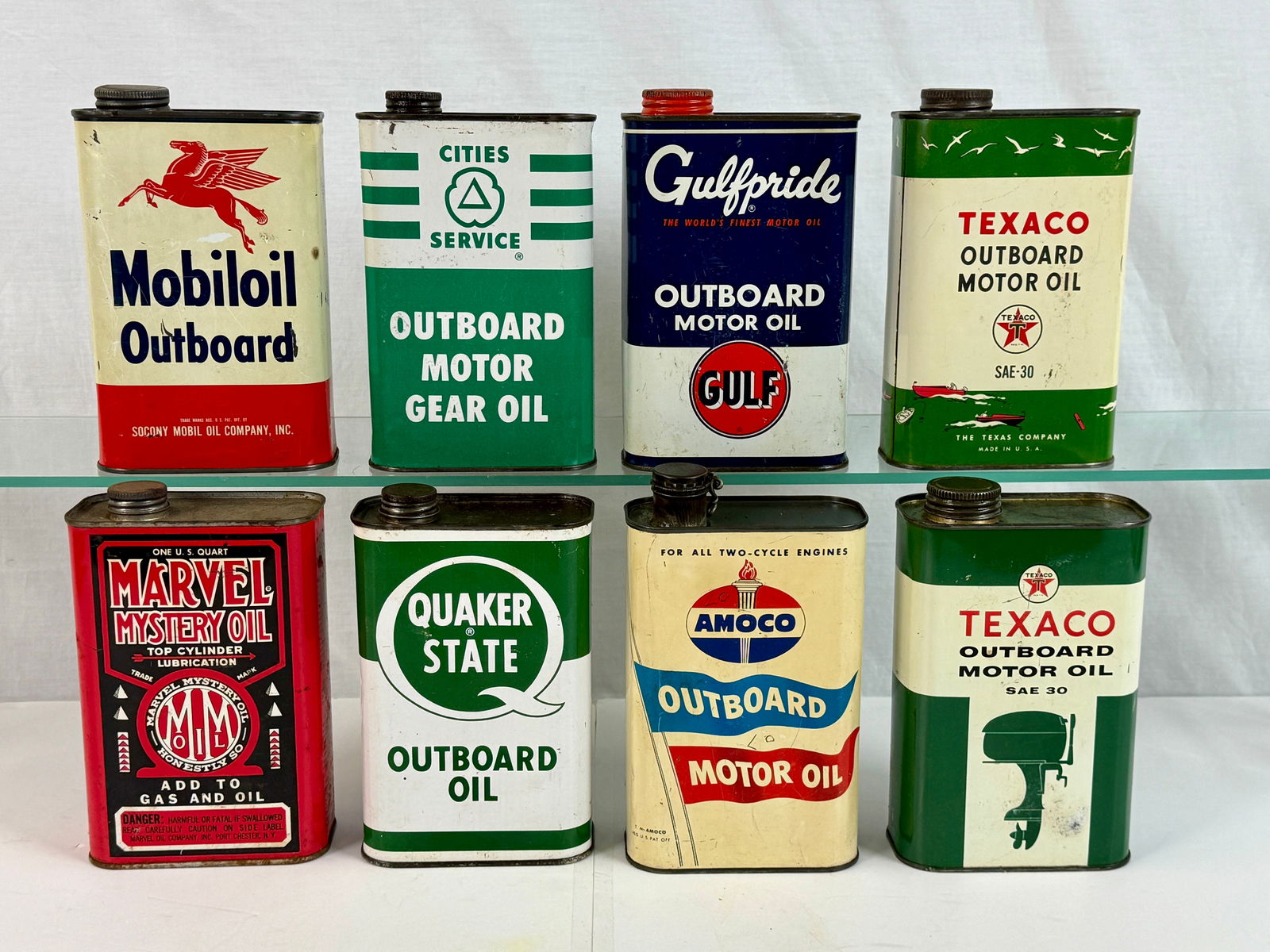 A Collection of Vintage Metal Outboard Motor Oil Cans (1 of 2)