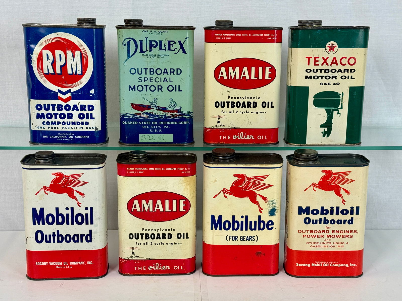 A Collection of Vintage Outboard Motor Oil and Lubricant Cans (1 of 2)