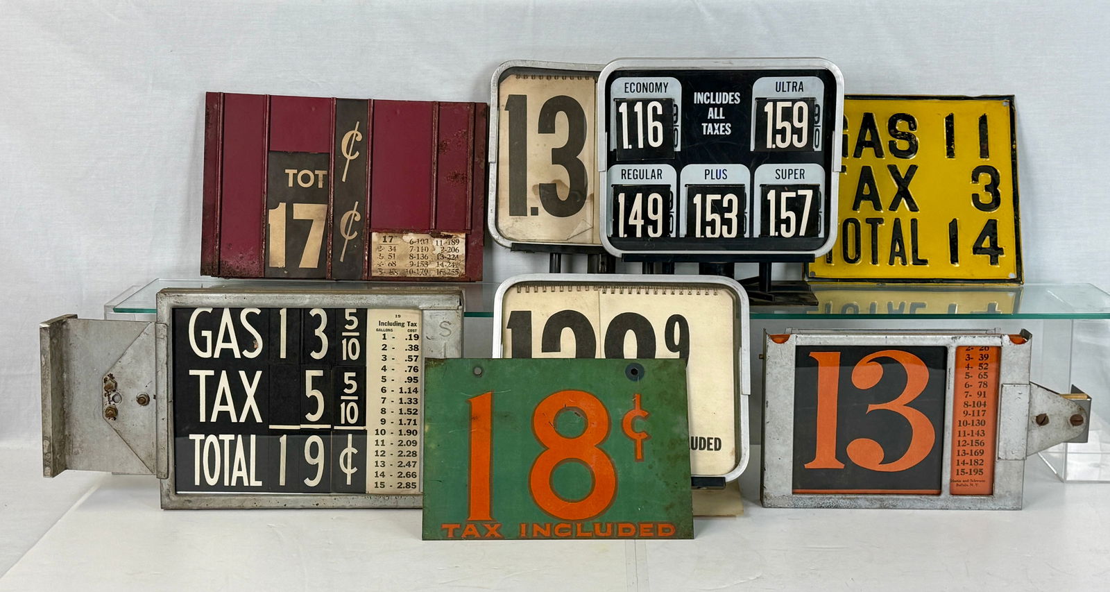A Collection of Vintage Gas Pump Price Signs and Displays (1 of 2)