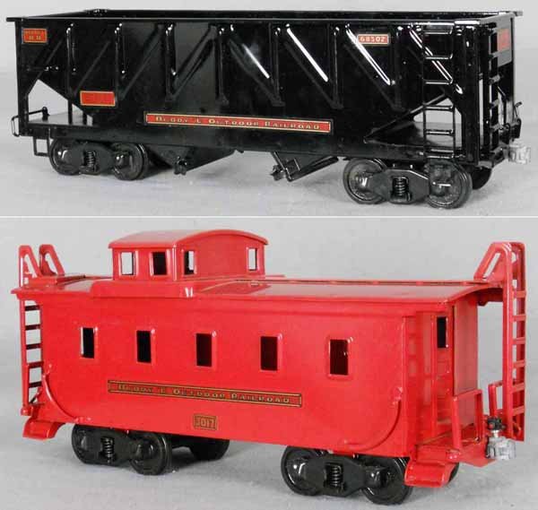 2 T-REPRODUCTIONS BUDDY L FREIGHT CARS: painted pressed steel, Hopper & Caboose, 1 die cast coupler broken, orig boxes, C8-9.