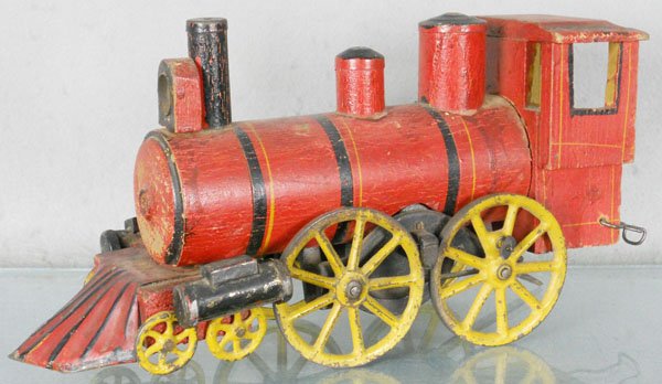 DP CLARK LOCOMOTIVE: wood w/metal trim, missing bell, 12 1/2" long, marked Pat'd 1897, both siderods broken, C5.