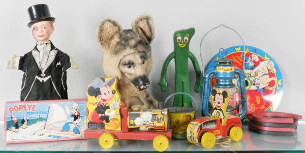 8 CHARACTER TOYS: Charlie McCarthy Puppet, Popeye Pencil Case, 485 Fisher Price Mickey Mouse Train, Rin-Tin-Tin, plush, Gumby, Lone Ranger Lantern, Popeye Sand Pail, some oxidation spots, 310 Fisher Price Puddle Jumper