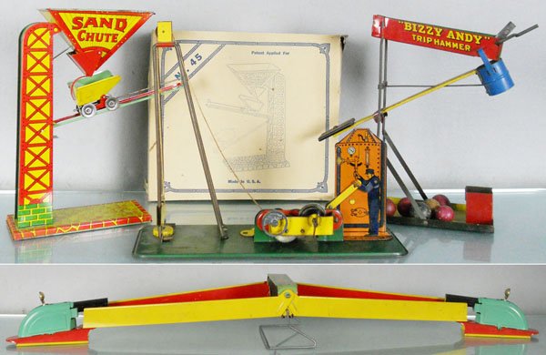 4 TIN TOYS: Chein 45 Sand Loader, orig box, Wolverine Pile Driver, Bizzy Andy Trip Hammer, Wolverine Marble Marksman, C5-7.