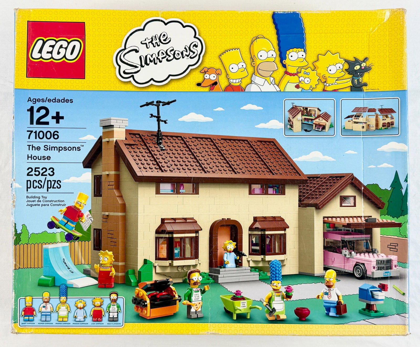 LEGO The Simpsons House Set 71006: This LEGO building construction set is identified as The Simpsons House, set number 71006, part of The Simpsons series. The completed house features a hinged center that opens for interior access and 