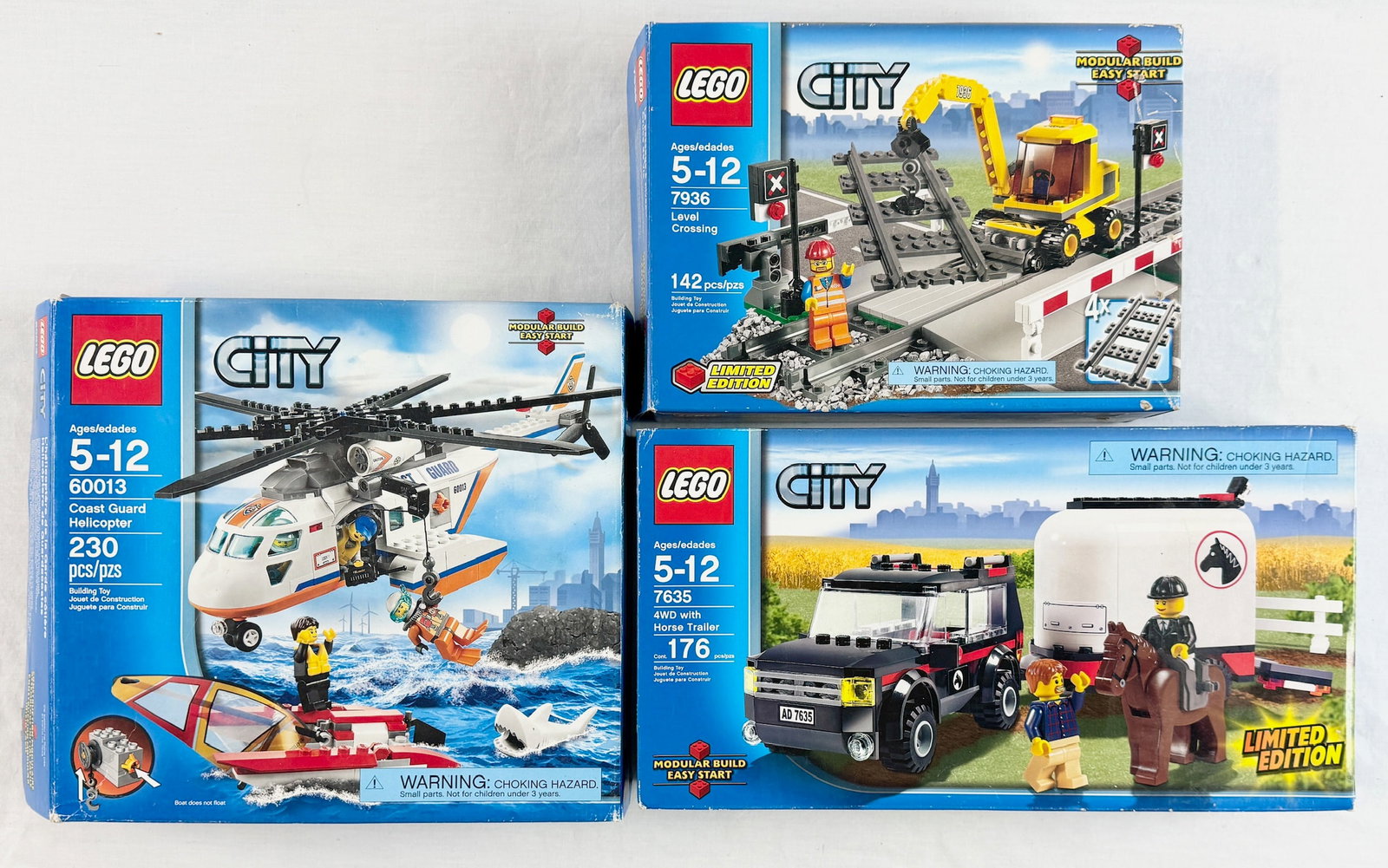 Three LEGO City Building Sets Including Coast Guard Helicopter 60013, Level Crossing 7936, and 4WD (1 of 3)