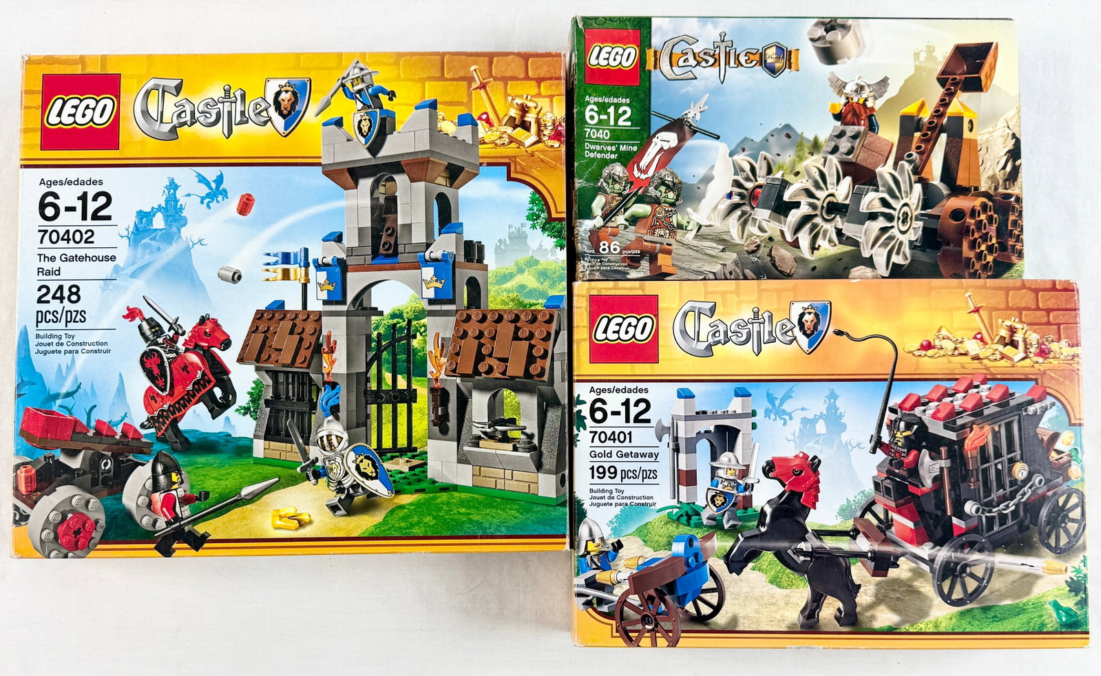 Three LEGO Castle Building Sets Including The Gatehouse Raid 70402 Gold Getaway 70401 and Dwarves (1 of 4)