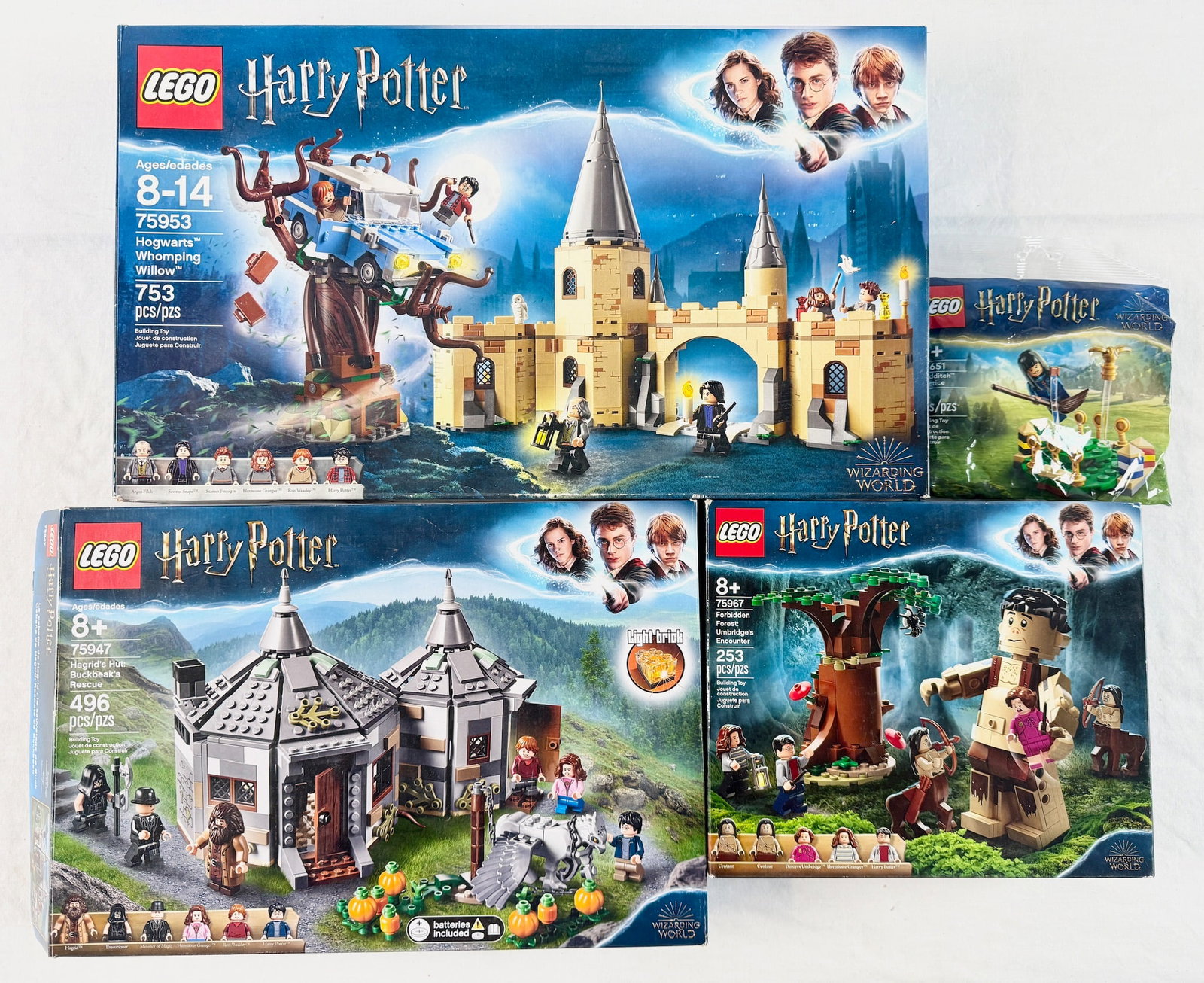 A Collection of Four LEGO Harry Potter Building Sets Including Hogwarts Whomping Willow and Hagrid's: A collection of four LEGO building sets from the Harry Potter Wizarding World theme. The collection includes the following items: LEGO Set 75953: Hogwarts Whomping Willow. This set contains 753 pieces