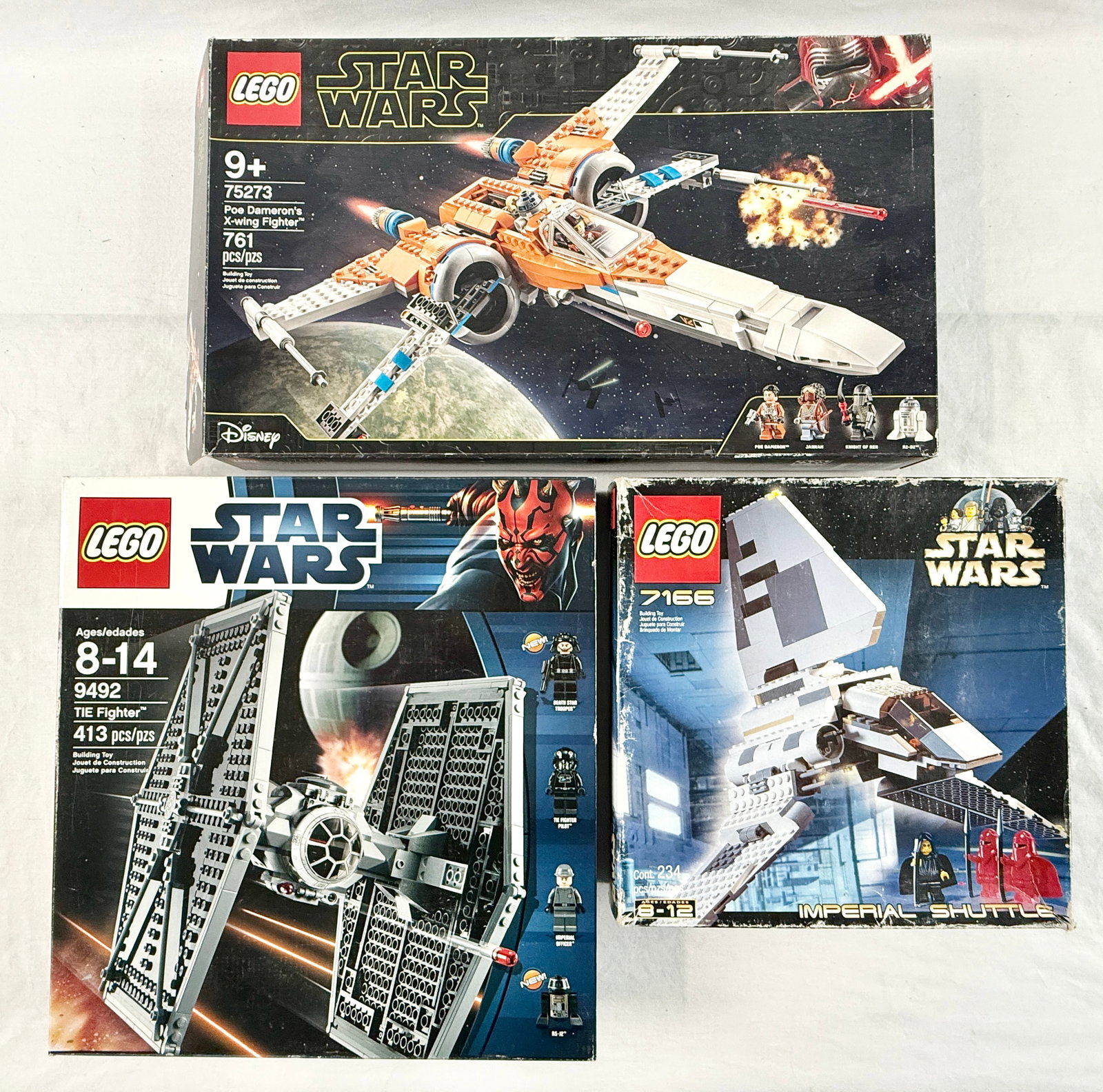 Three LEGO Star Wars Building Sets including Poe Dameron's X-wing Fighter 75273, TIE Fighter 9492,: A collection of three plastic building sets manufactured by LEGO under the Star Wars license. The group consists of retired sets from various eras of the franchise. Set No. 75273 Poe Dameron's X-wing