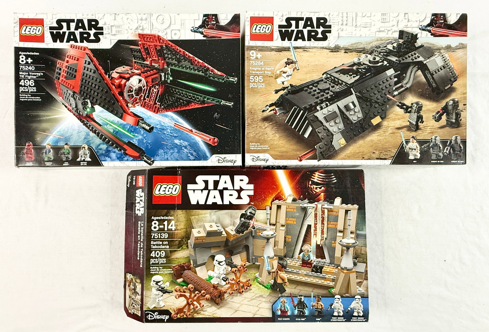 Three LEGO Star Wars Sets including Major Vonreg's TIE Fighter, Knights of Ren Transport Ship, and: Manufactured by LEGO, this collection of three Star Wars themed construction sets includes Major Vonreg's TIE Fighter (Set 75240), Knights of Ren Transport Ship (Set 75284), and Battle on Takodana (Se