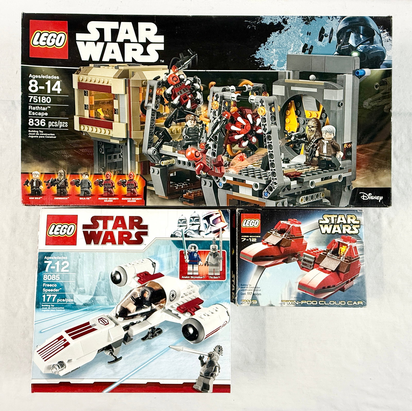 Three LEGO Star Wars Building Sets including Rathtar Escape 75180, Freeco Speeder 8085, and Twin-Pod (1 of 5)