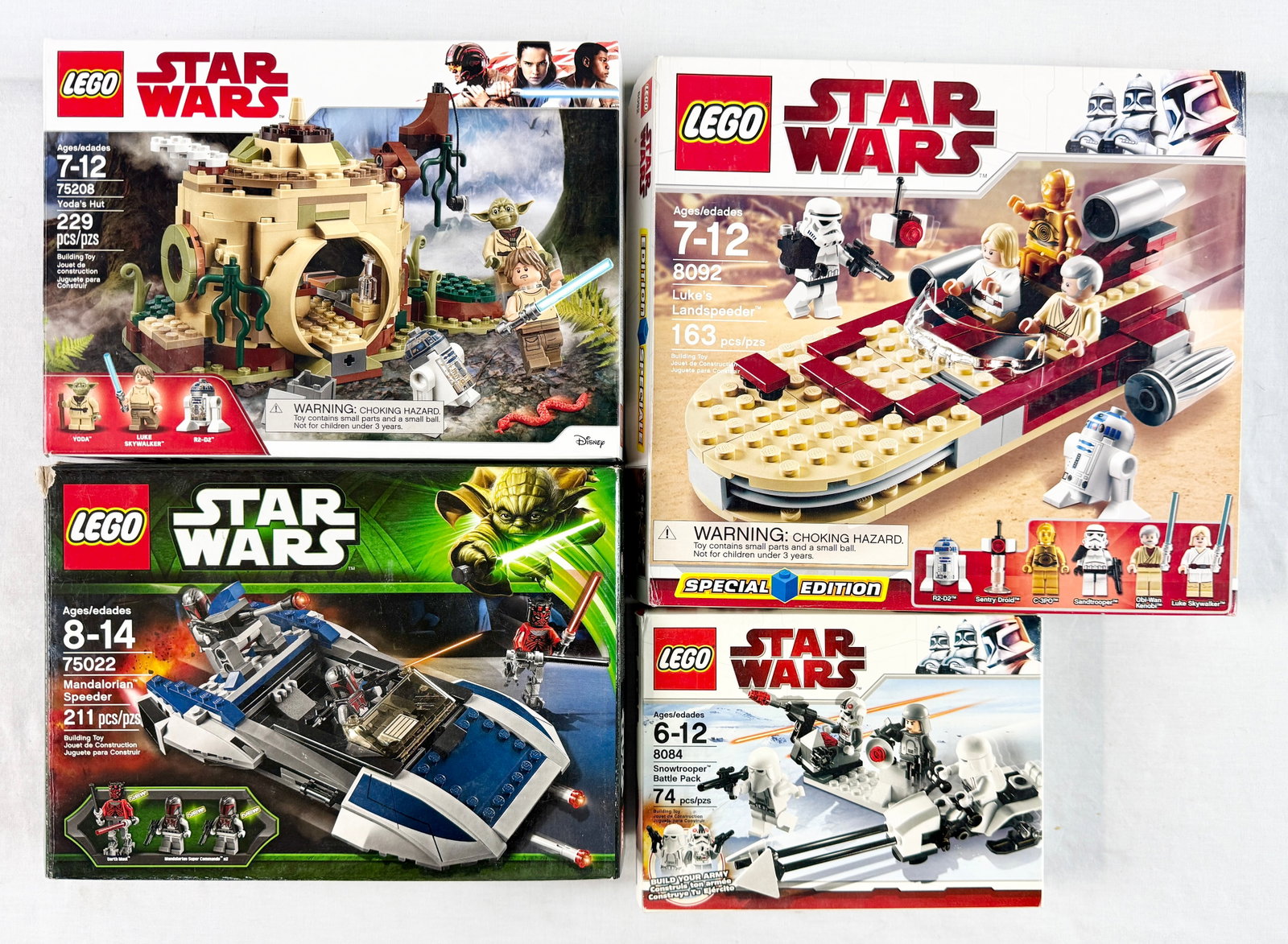 A Collection of Four LEGO Star Wars Construction Sets Including Yodas Hut Lukes Landspeeder (1 of 6)