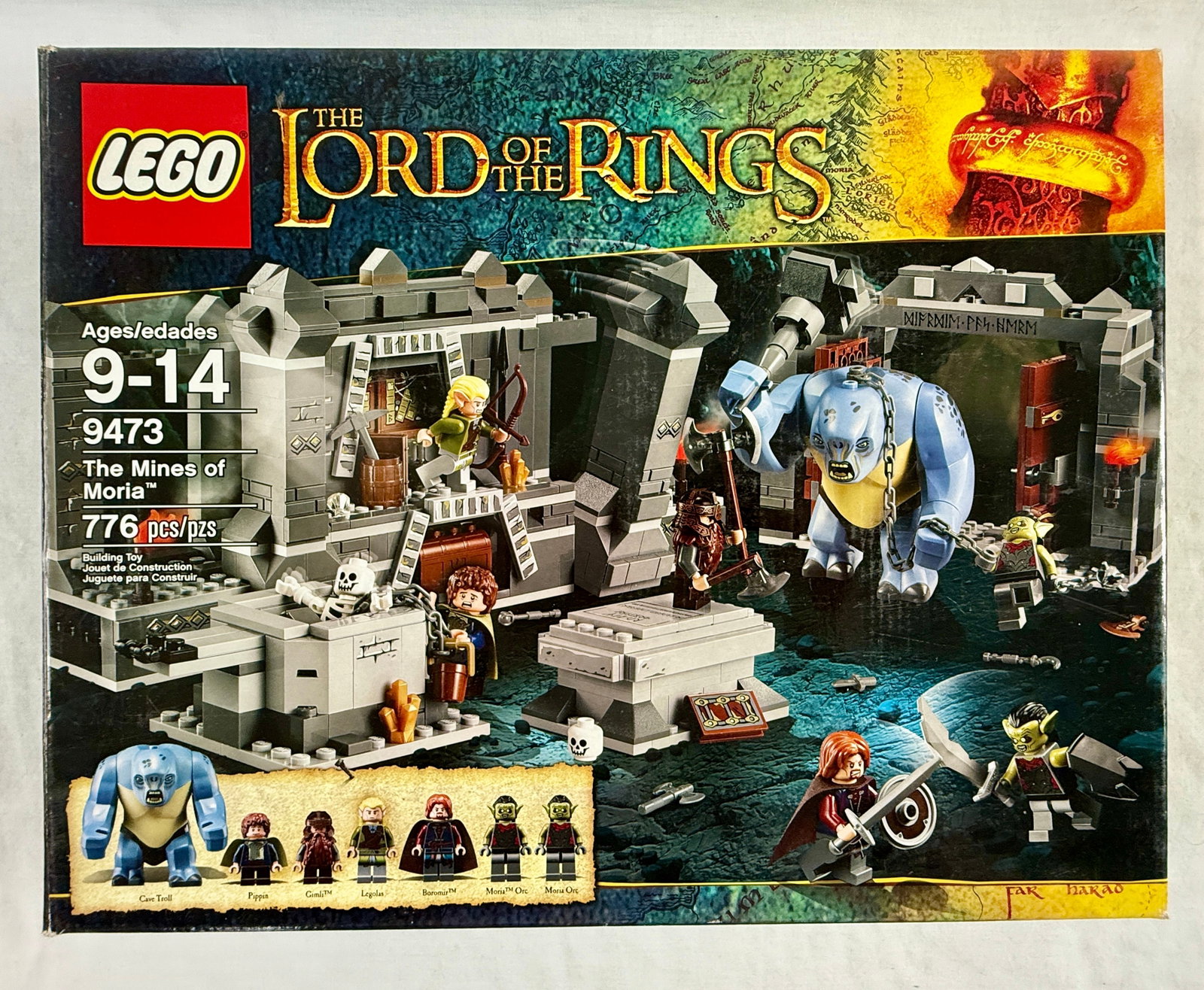 LEGO The Lord of the Rings The Mines of Moria Set 9473: This building toy set is manufactured by the LEGO Group as part of the Lord of the Rings theme. Identified as set number 9473, titled The Mines of Moria, it contains components for a scene featuring s