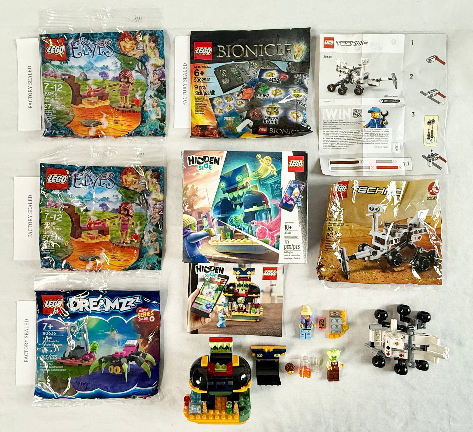 An Assortment of LEGO Construction Sets including Hidden Side, Technic, Elves, DreamZzz, and (1 of 3)