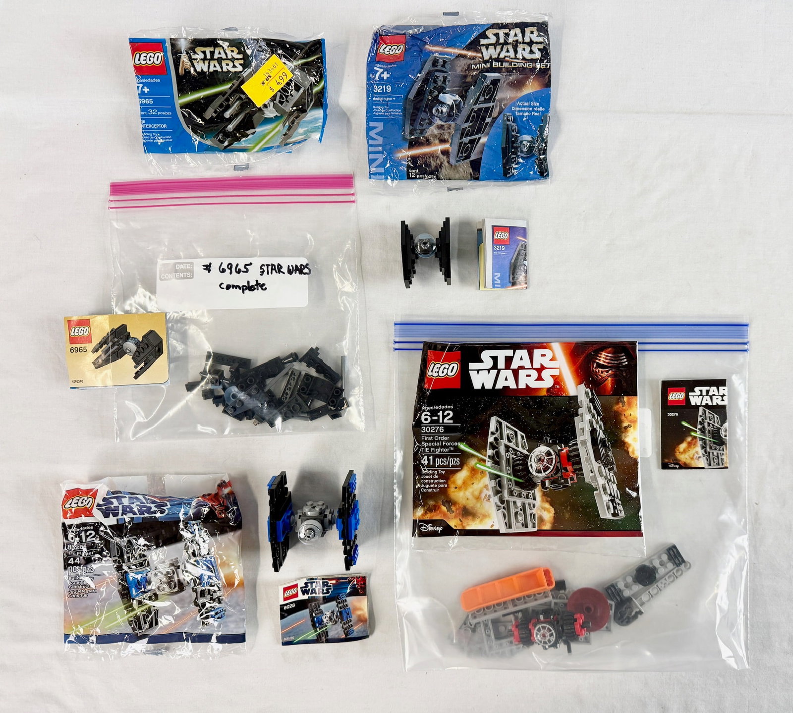 A Collection of Four LEGO Star Wars Mini Building Sets Featuring TIE Fighter Models (1 of 1)