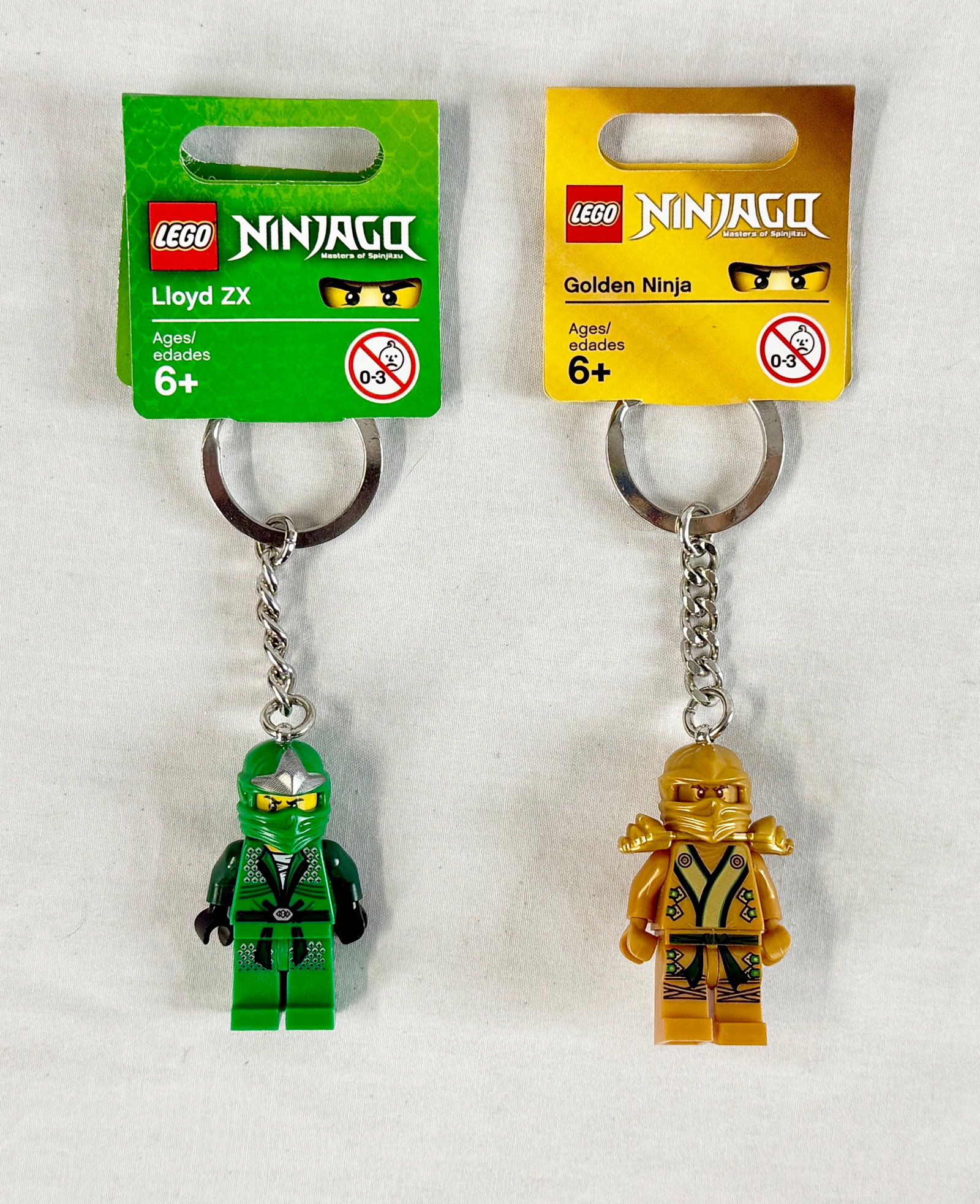 A Pair of LEGO Ninjago Minifigure Keychains including Lloyd ZX and Golden Ninja 850442, 850622 (1 of 2)