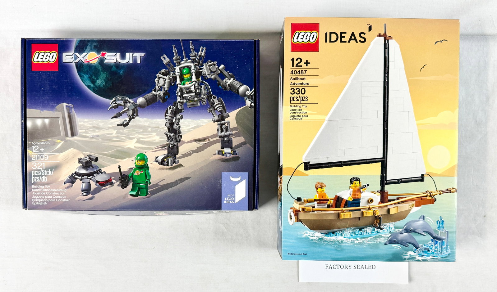 A Pair of LEGO Ideas Building Sets Including Exo Suit 21109 and Sailboat Adventure 40487 (1 of 3)