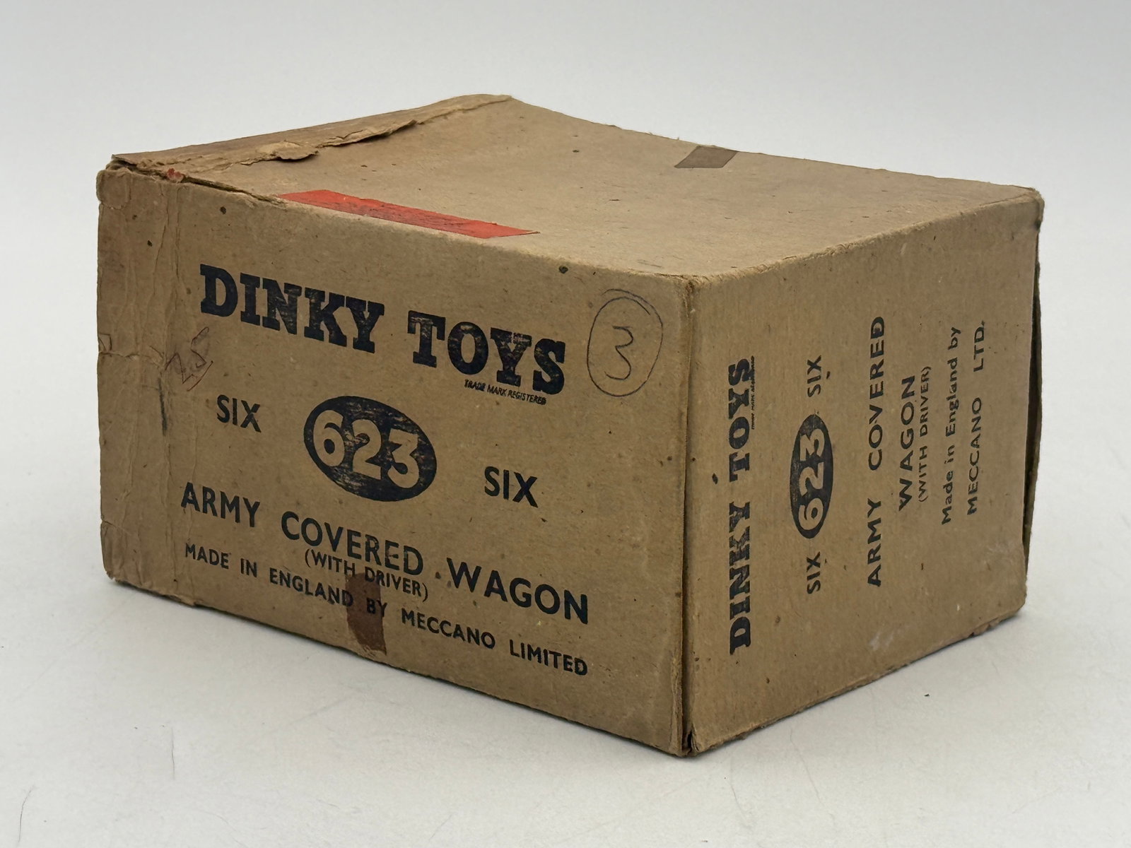 A Collection of Dinky Toys 623 Army Covered Wagons: A collection of Dinky Toys 623 Army Covered Wagons, manufactured in England by Meccano Limited. These die-cast metal vehicles feature an olive green finish with matching removable canopies and include