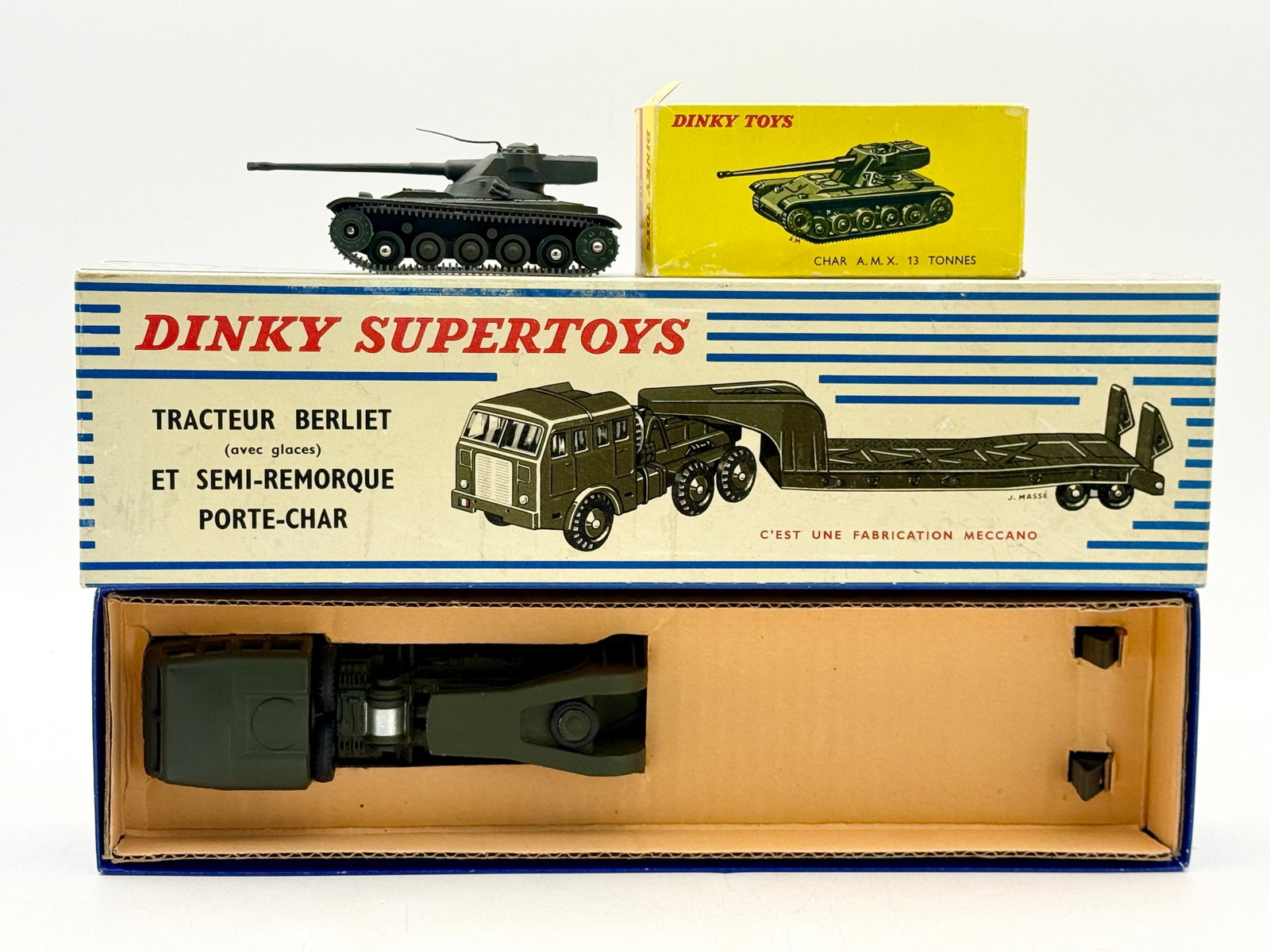 French Dinky Supertoys 890 Berliet Tank Transporter and 817 Tank: This French Dinky Supertoys set includes a die-cast olive drab Berliet tractor with semi-remorque porte-char and a matching AMX 13-ton tank. Both models are accompanied by their original period packag