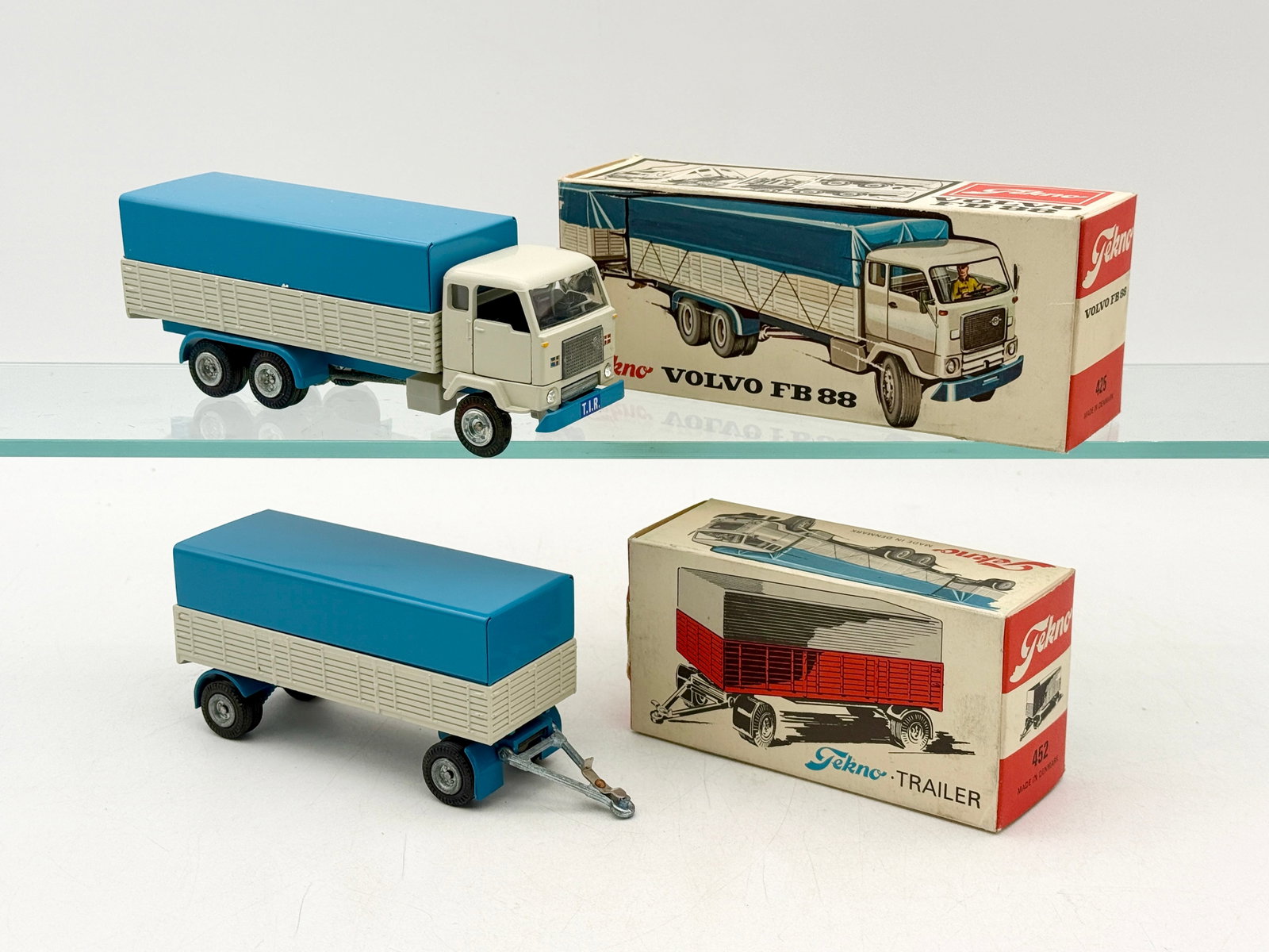 A Pair of Tekno Volvo FB 88 Vehicles with Boxes (1 of 3)