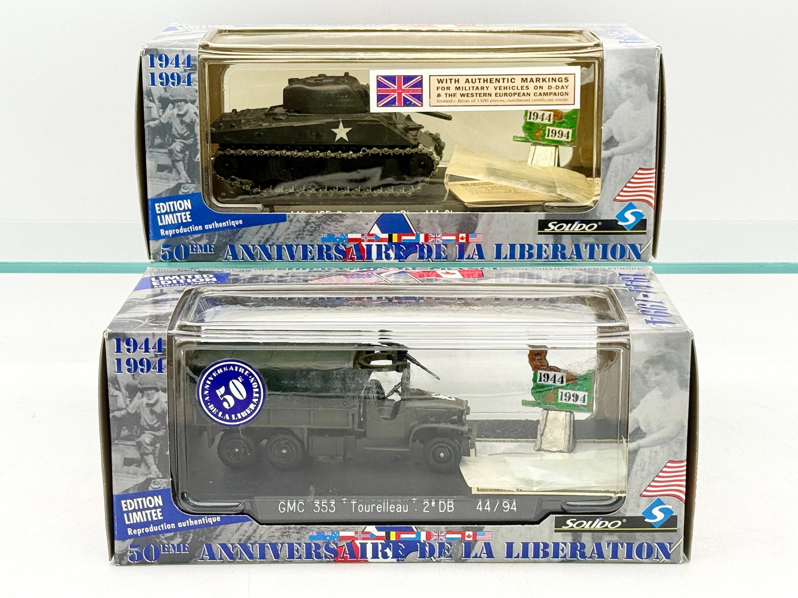 A Pair of Solido 50th Anniversary Liberation Die-Cast Vehicles: A pair of Solido die-cast military vehicles from the 50th Anniversary of the Liberation series, manufactured in France circa 1994. This collection features model 4494/42, a Sherman M4 A3 tank, and mod
