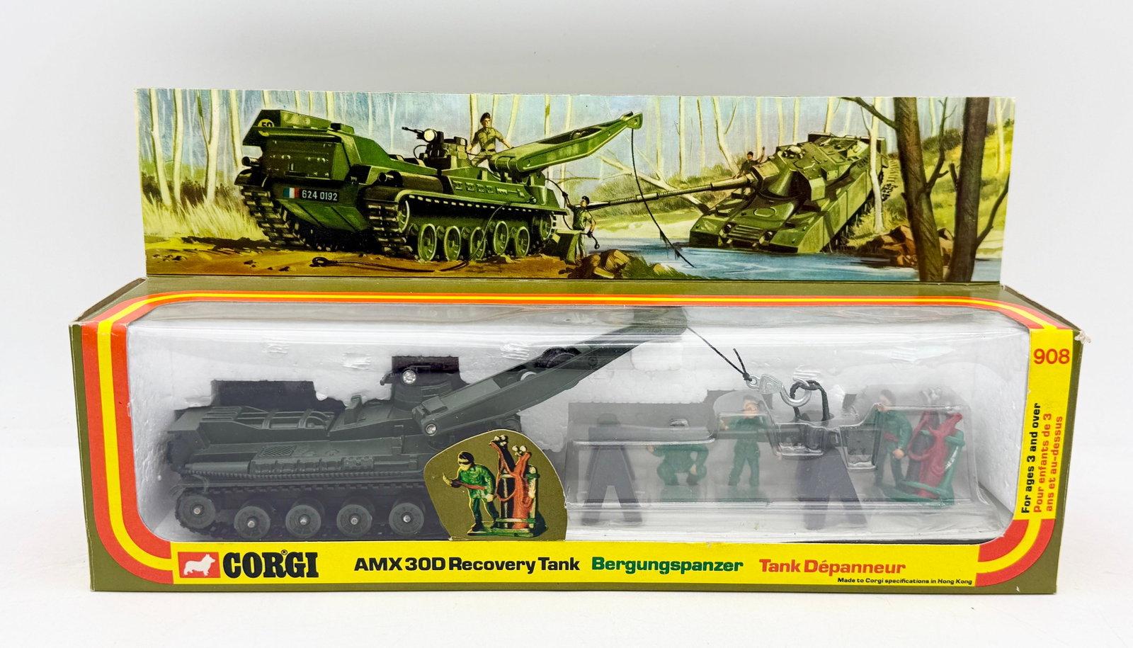 Corgi Toys 908 AMX 30D Recovery Tank Die-Cast Military Set: A Corgi Toys number 908 AMX 30D Recovery Tank die-cast military vehicle set manufactured by The Mettoy Co. Ltd. The olive green model features a rotating turret with an adjustable crane jib and a fron