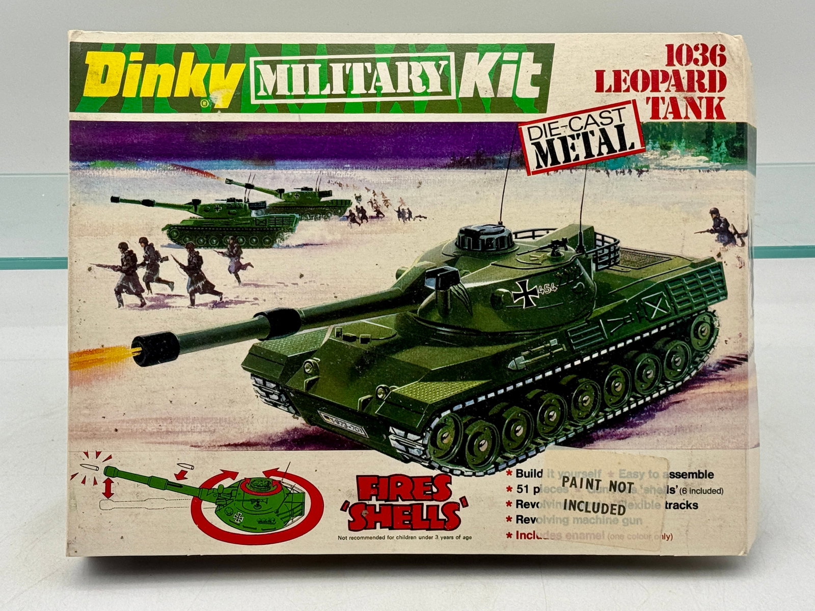 Dinky Military Kit No. 1036 Leopard Tank: A vintage Dinky No. 1036 Leopard Tank military kit manufactured by Meccano Limited in 1974. This unassembled 51-piece model features die-cast metal components including the hull and turret along with 