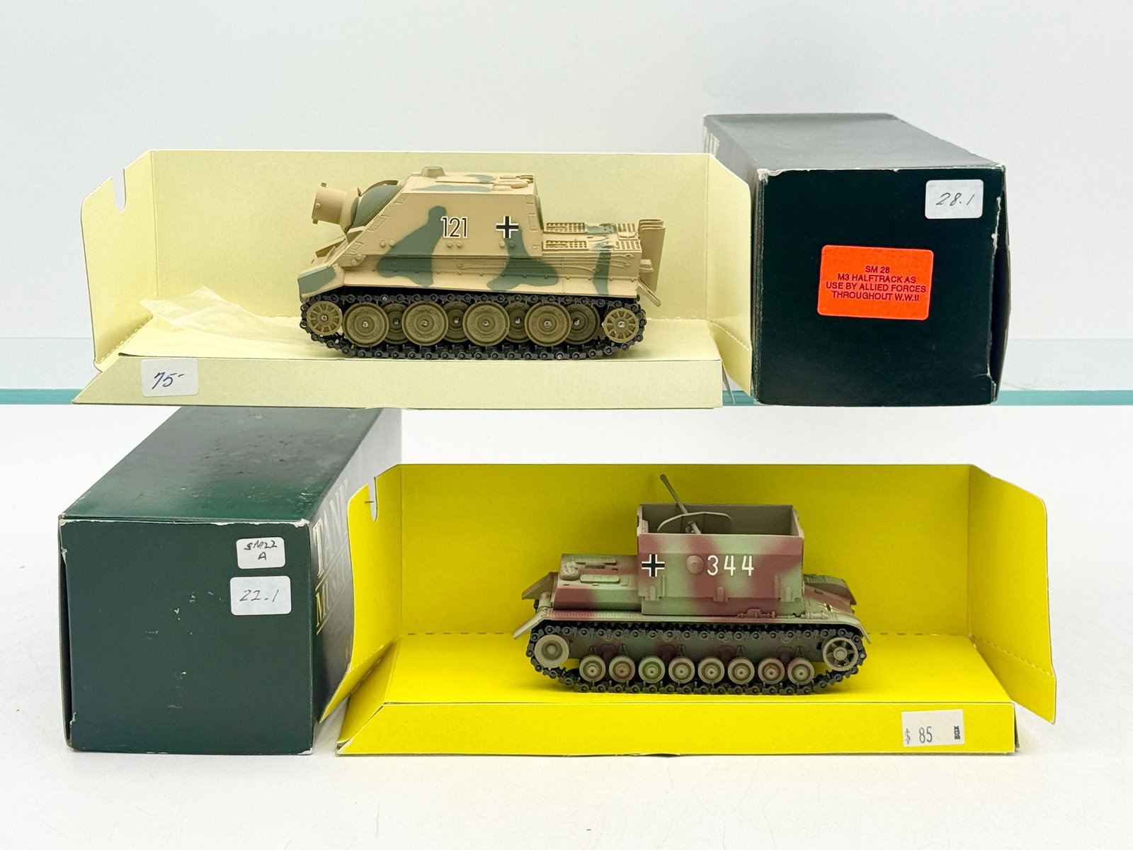 Two Sandford Models German World War II Armored Vehicles: Two Sandford Models Tank Museum series German armored vehicles, featuring a Sturmtiger numbered 121 and a Wirbelwind numbered 344. These hand-painted scale models are finished in multi-tone camouflage