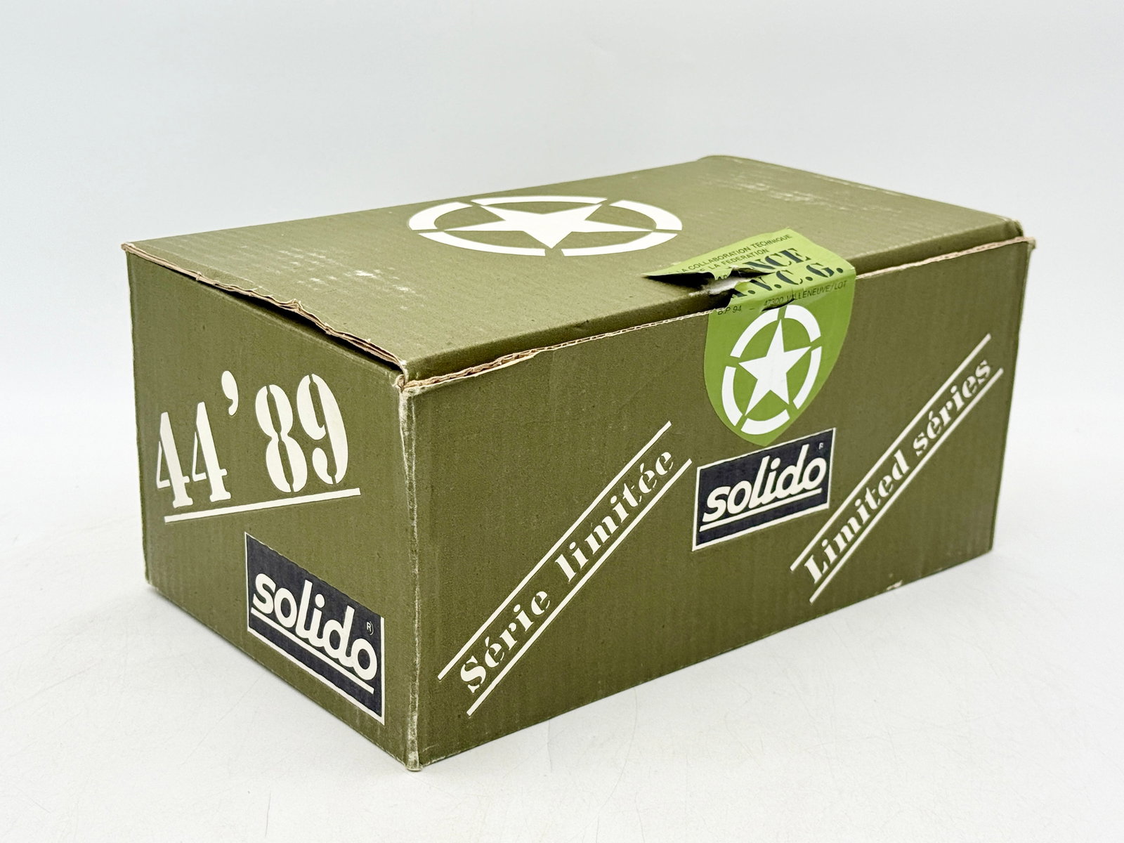 Solido Overlord 89 Limited Edition Set of Twelve Military Vehicles: This Solido Overlord 89 limited edition commemorative set comprises twelve die-cast military vehicles. Each model is secured in a clear acrylic display case with a labeled brown base, all contained wi