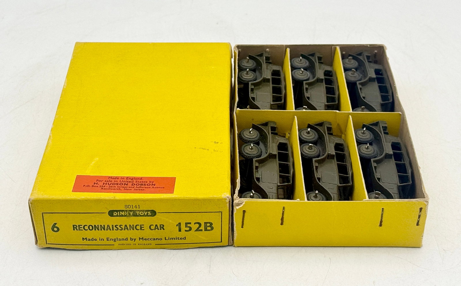 Dinky Toys No. 152B Reconnaissance Cars in Original Trade Box: Dinky Toys No. 152B Reconnaissance Cars produced by Meccano Limited. Each vehicle is constructed of die-cast metal finished in olive drab paint featuring six wheels and open-top seating. The assortmen