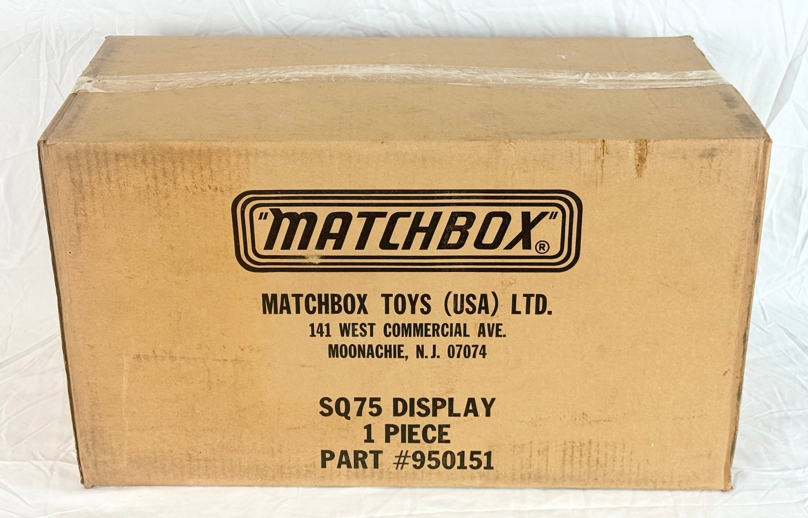 Matchbox Toys SQ75 Rotating Display Case Original Shipping Box: This vintage Matchbox Toys (USA) Ltd. corrugated cardboard shipping box is designed for the SQ75 display unit. The front face displays the company logo and Moonachie, New Jersey address alongside part