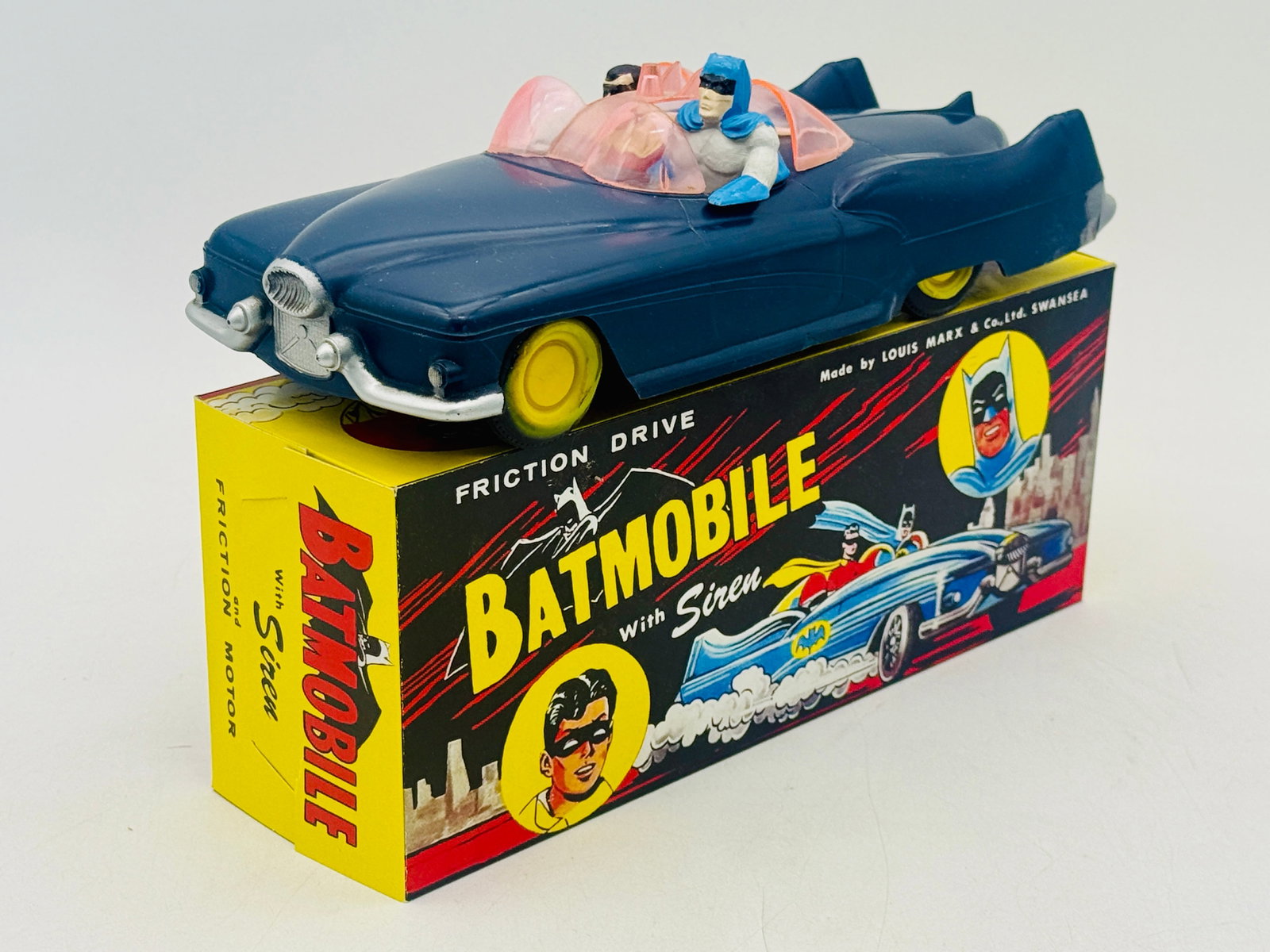 Marx 1966 Friction-Drive Plastic Batmobile. Original Rare: This 1966 Louis Marx and Co. Batmobile is a friction-driven model produced at the manufacturer's Swansea factory in Wales. Constructed from dark blue molded plastic, the vehicle features three translu