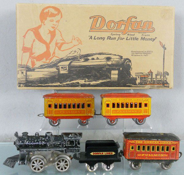 DORFAN 120 TRAIN SET: O ga, loco, windup working, motor replaced, w/repro tender, 3 Pullmans, 1 has 2 broken couplers, track, orig box, C5-6.